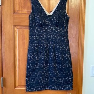 Black lace over cream dress